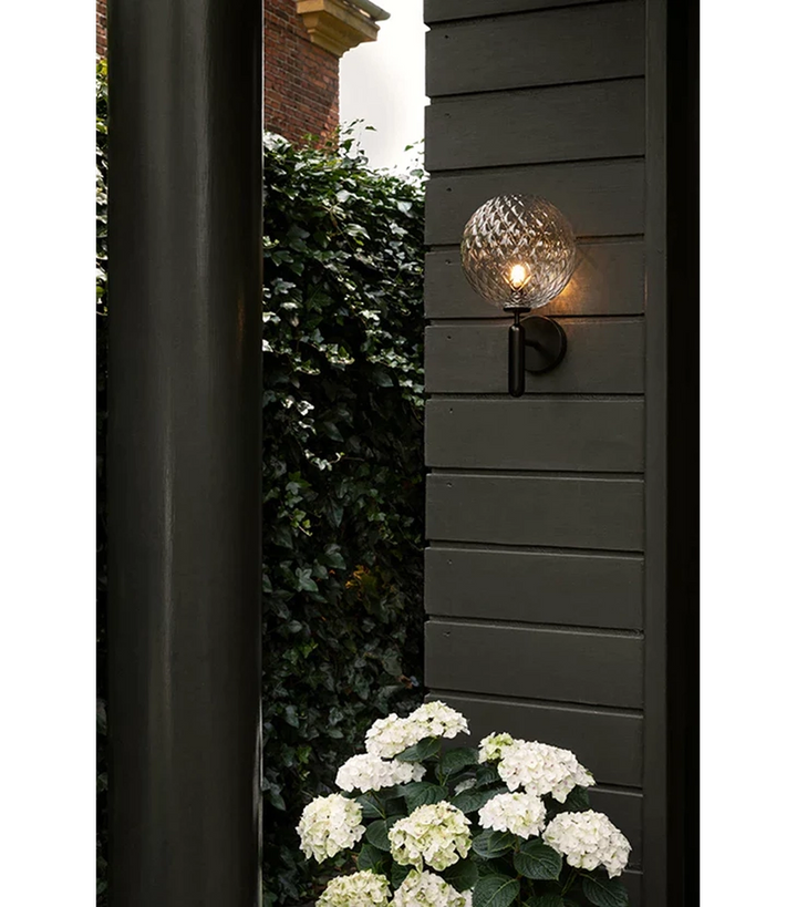 Nuura Miira utendørslampe - svart / optikk-Utebelysning vegg klassisk-Nuura-Svart-Nua__2035005-Lightup.no