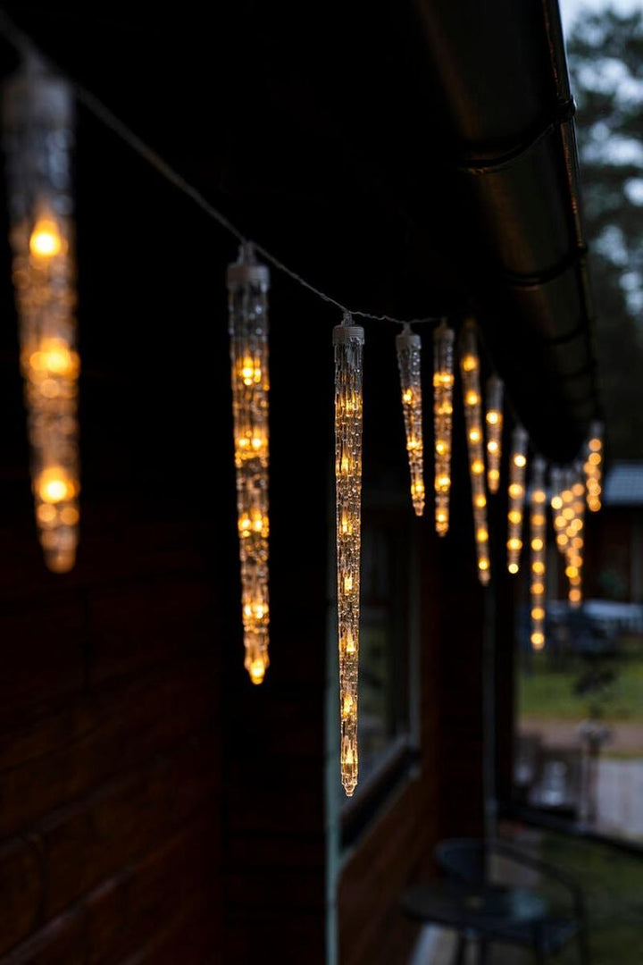 Istappslynge i akryl med 80 LED – Varmhvit-Julebelysning juletrelys ute-Konstsmide-Klar-2701-103-Lightup.no