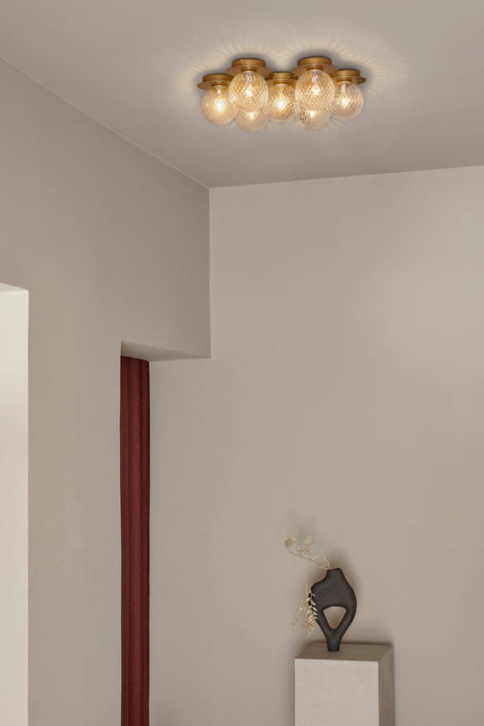 Nuura Liila Star / optikk glass-Vegglamper-Nuura-Messing-Nua__2041005-Lightup.no
