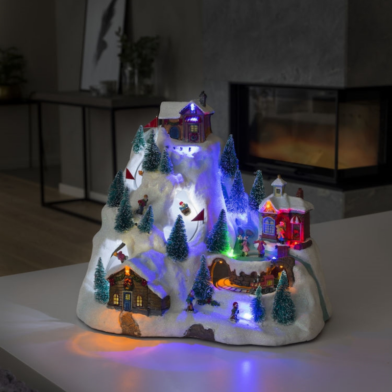 Mekanisk juleby dekorasjon fjell med 8 sanger-Julebelysning dekor og pynt-Konstsmide-3403-000-Lightup.no