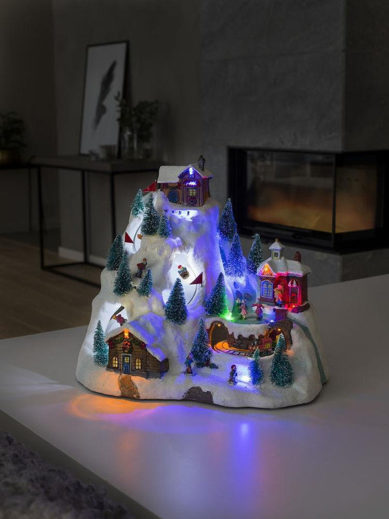 Mekanisk juleby dekorasjon fjell med 8 sanger-Julebelysning dekor og pynt-Konstsmide-3403-000-Lightup.no