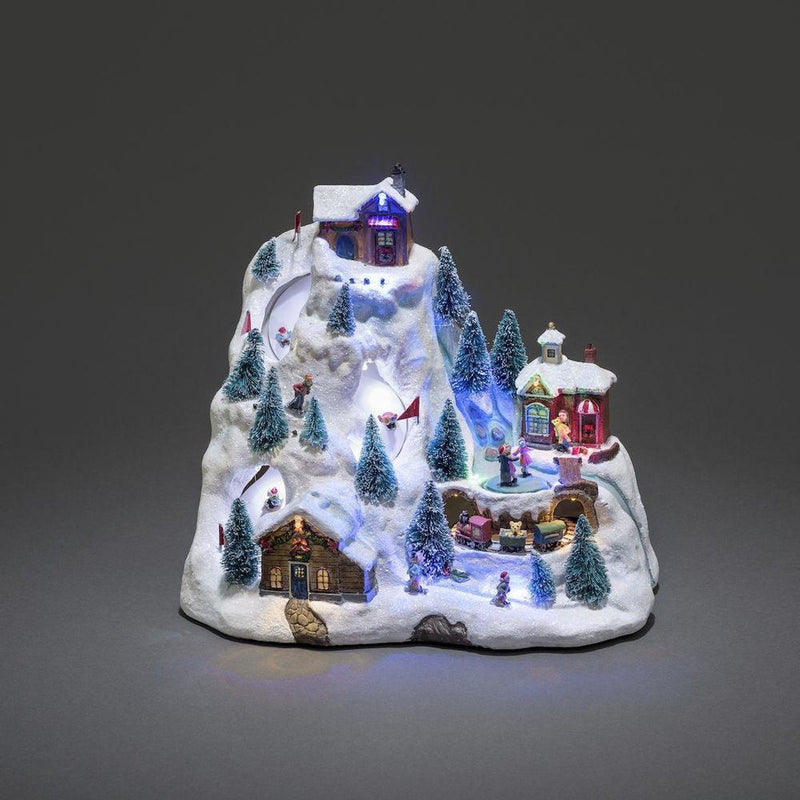 Mekanisk juleby dekorasjon fjell med 8 sanger-Julebelysning dekor og pynt-Konstsmide-3403-000-Lightup.no