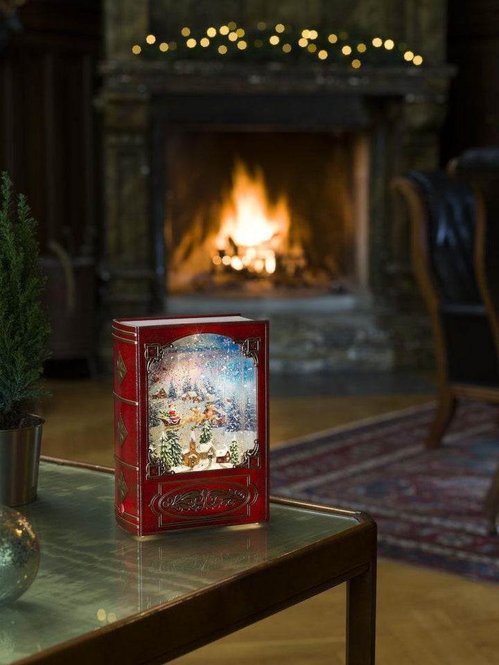 Vannfylt bok med flyvende nisse-Julebelysning dekor og pynt-Konstsmide-Rød-4272-550-Lightup.no